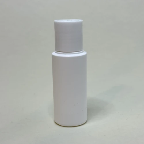 Butelka 50 ml cylindryczna HDPE z zamknięciem typu DiscTop w kolorze białym, odporne na chemię opakowanie, do szamponów, próbek, estetyczne rozwiązanie z funkcjonalnym mechanizmem naciśnij-otwórz, zapewniające wygodne dozowanie preparatów.